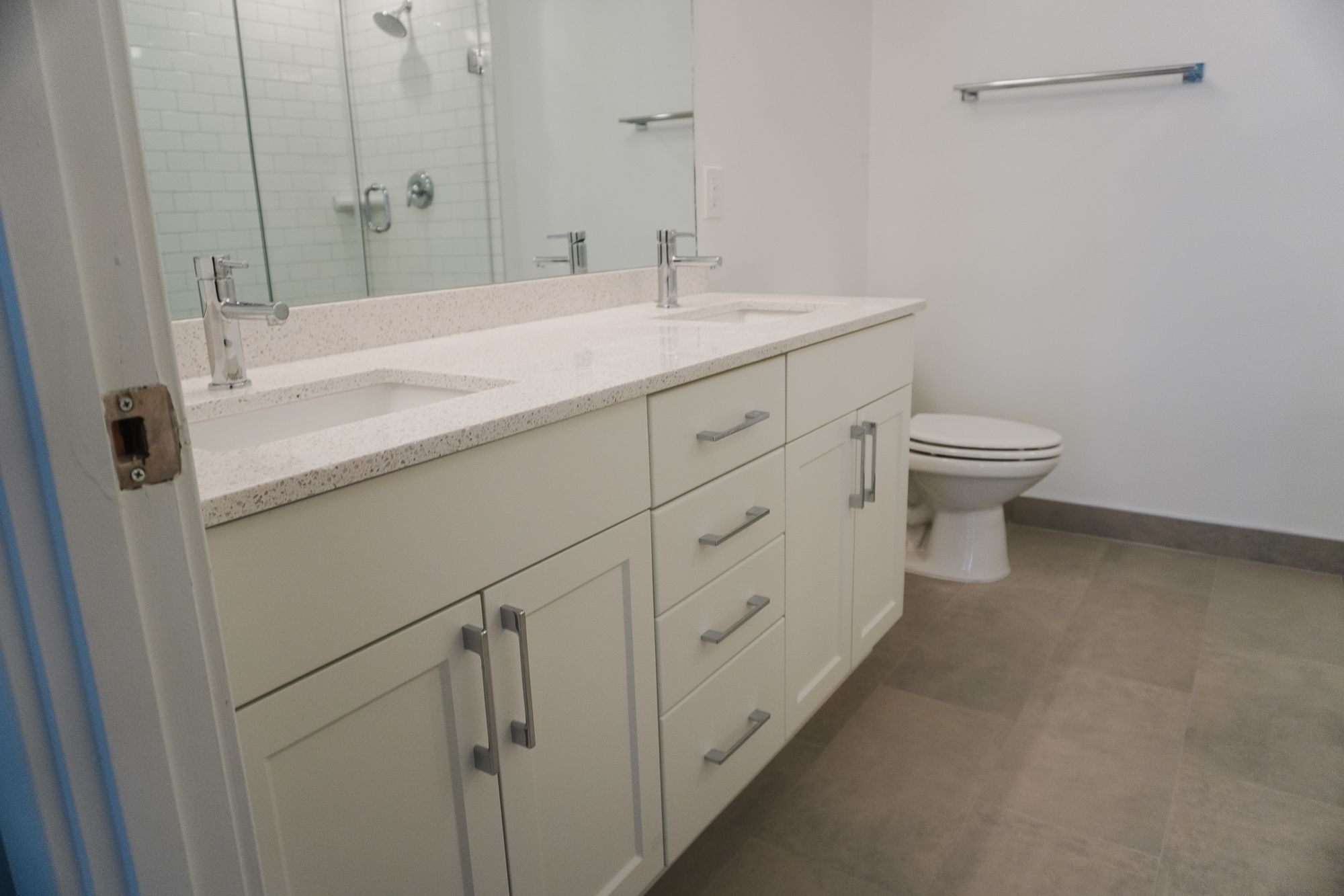 Renovated bathroom with a double vanity at DSC Apartments, Arlington, VA