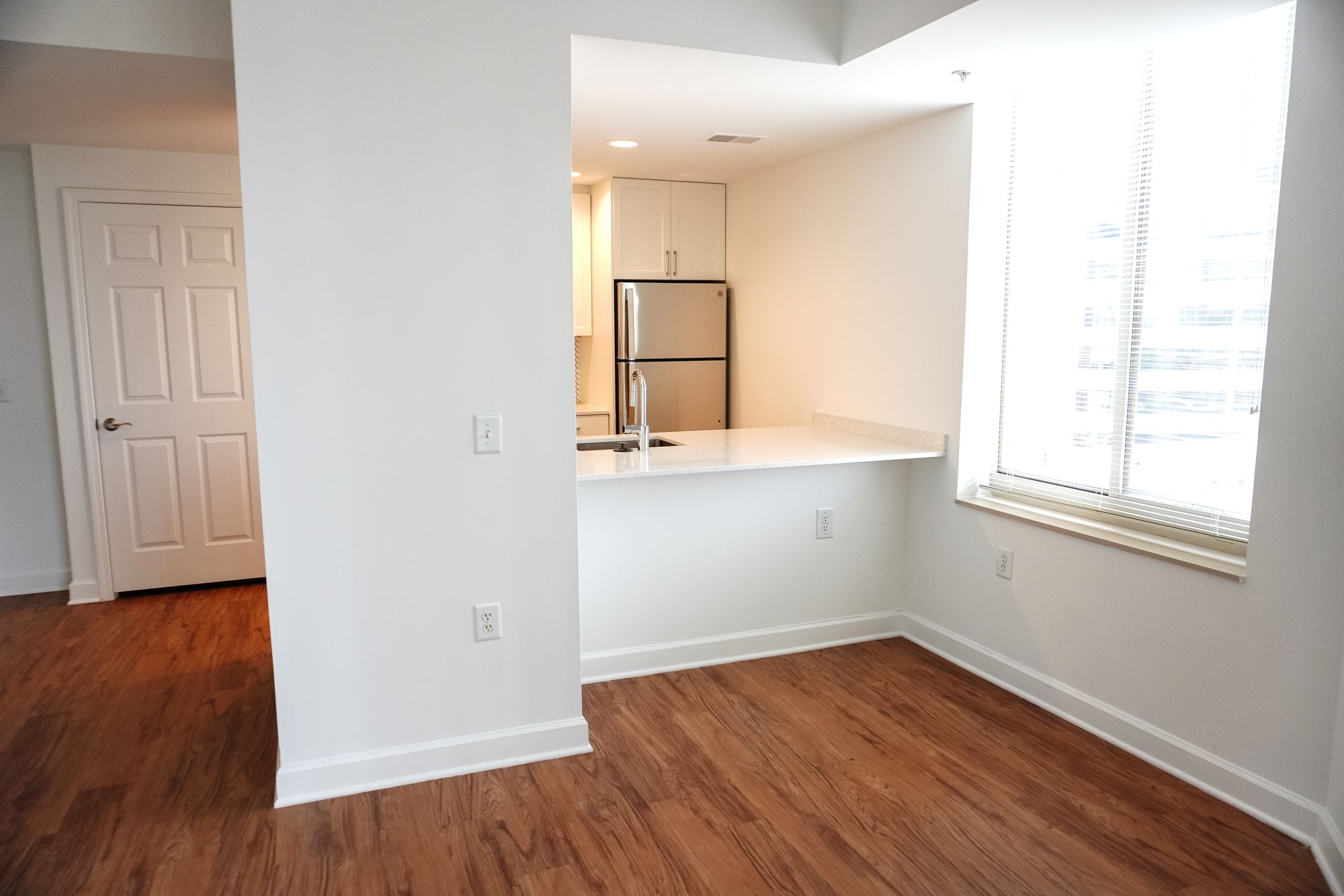 Finished unit with a kitchen pass-through and living area