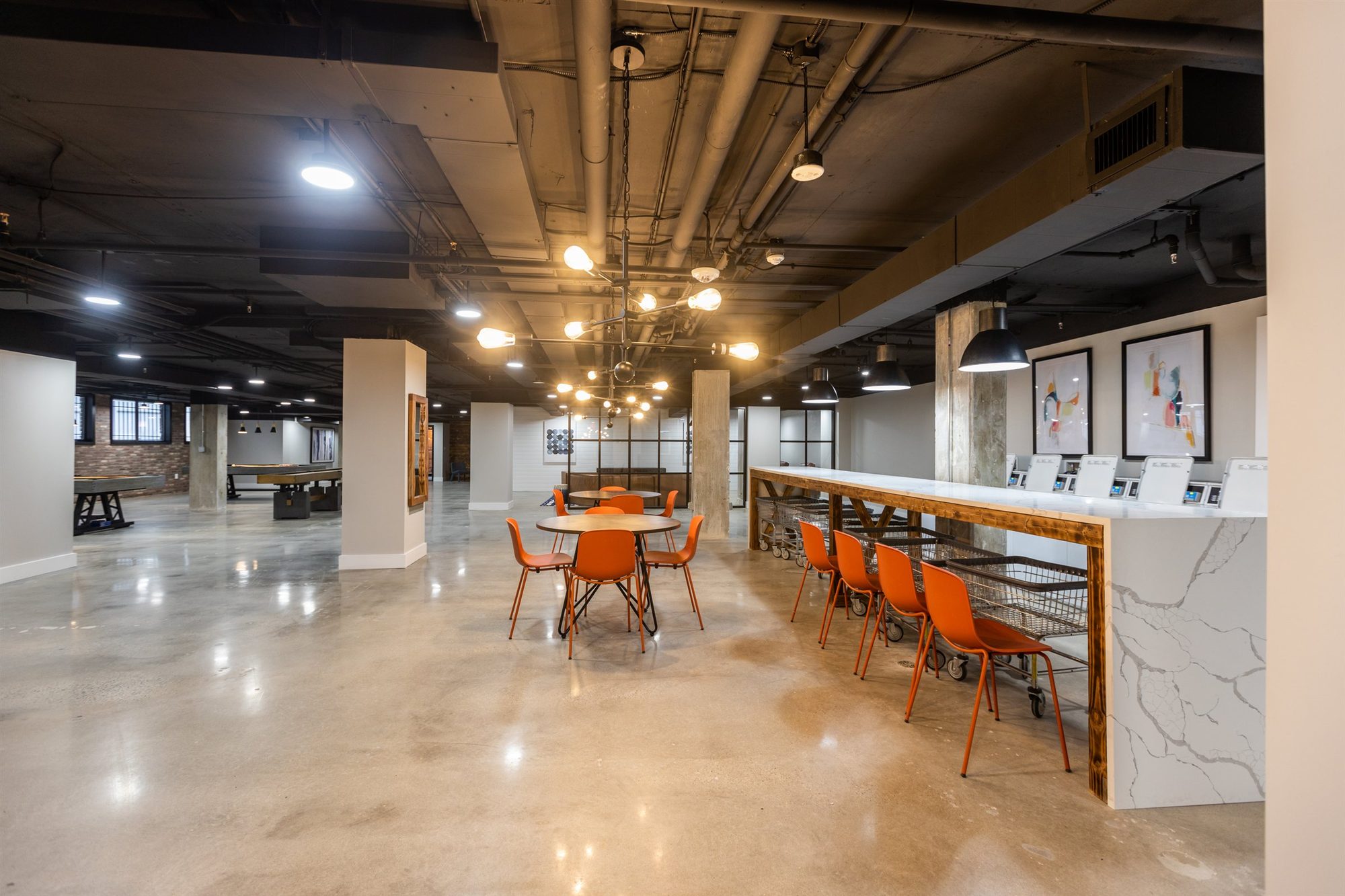 Resident amenity lounge with community bar seating